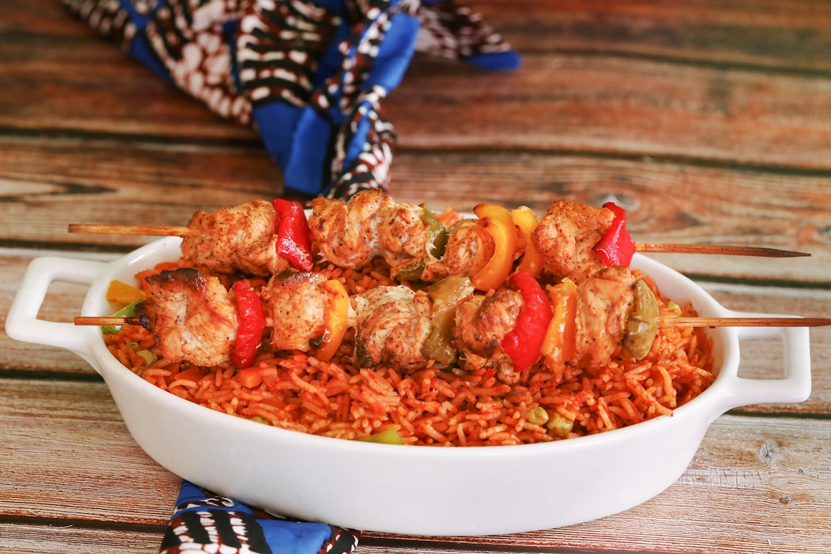 Jollof rice with grilled skewers